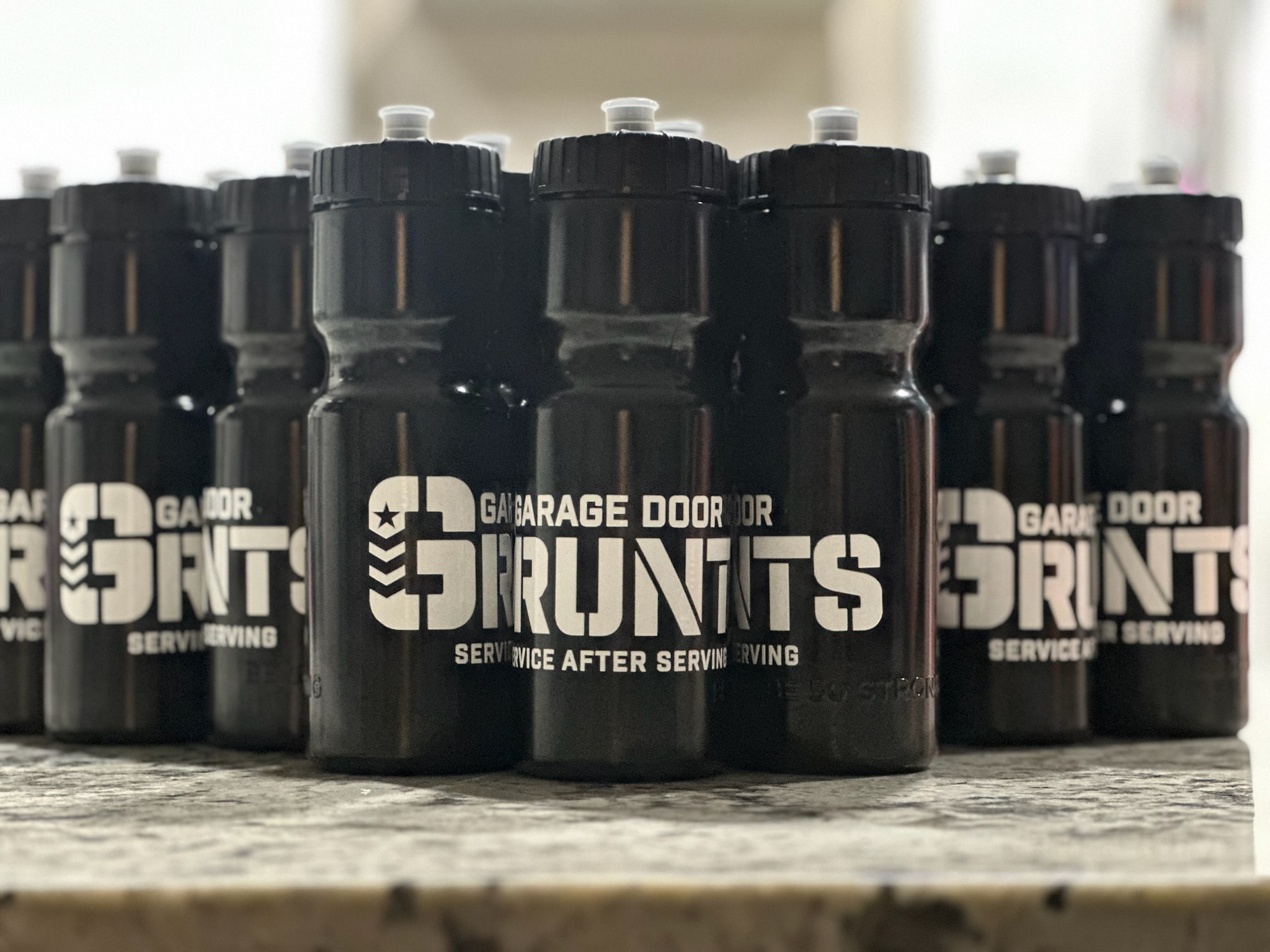 Garage Door Grunts Water Bottles